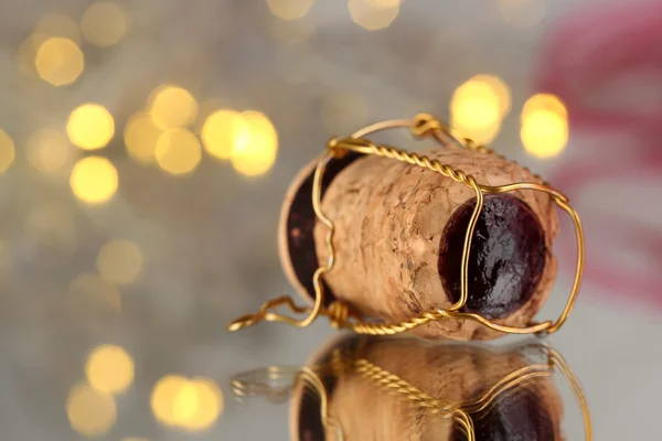 Szampana, korek na tle światła Bożego Narodzenia — Zdjęcie stockowe