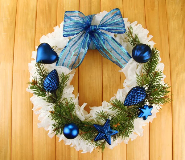 Christmas wreath on wooden background — Stock Photo, Image