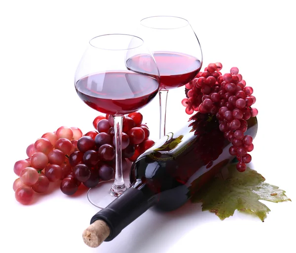 Wineglasses with red wine, grape isolated on white Royalty Free Stock Images