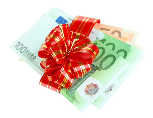 Euro banknotes with red bow isolated on white — Stock Photo, Image