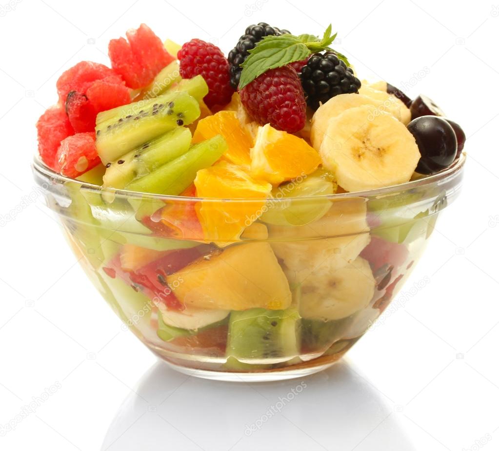 fresh fruits salad in bowl isolated on white