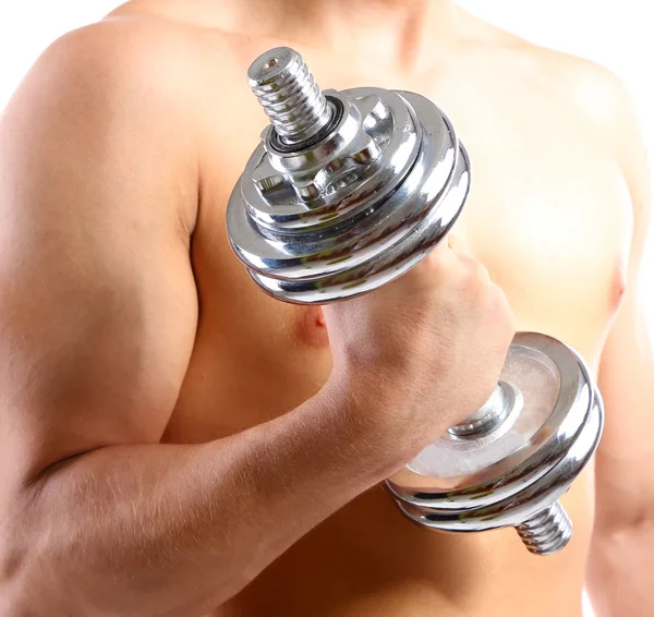 Handsome young muscular sportsman execute exercise with dumbbell, isolated on white — Stock Photo, Image