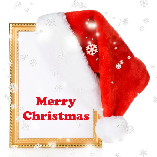 Christmas hat hung on old frame isolated on white — Stock Photo, Image