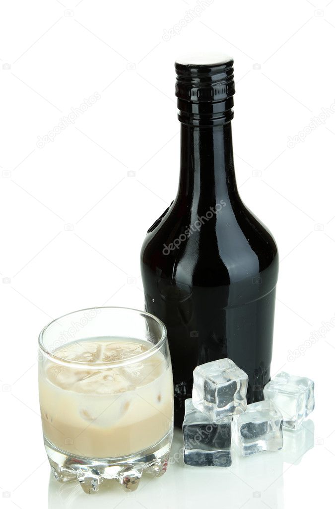 Baileys liqueur in bottle and glass isolated on white Stock Photo by