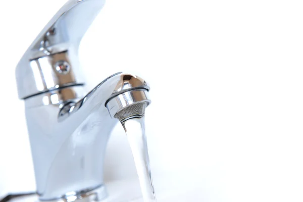 Close-up of human hands being washed under faucet in bathroom, isolated on white — Stock Photo, Image