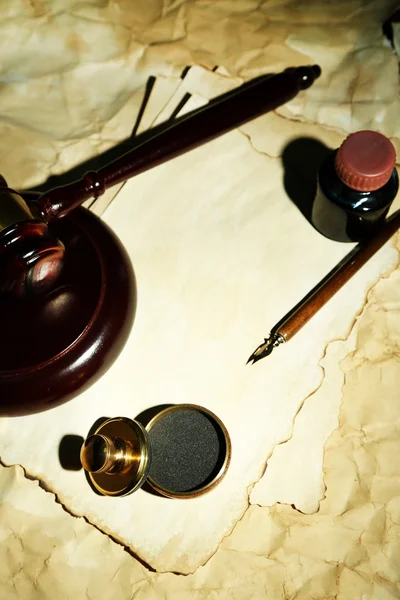 Wooden stamp, gavel and old papers, close up — Stock Photo, Image