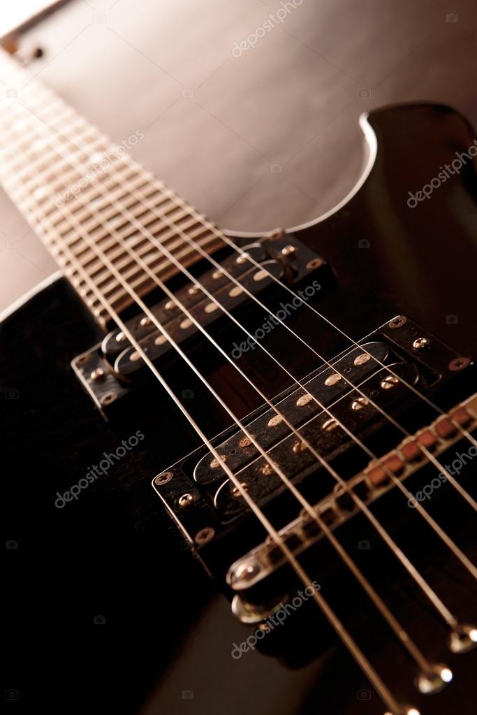 Electric guitar , close up Stock Photo by ©belchonock 36487285