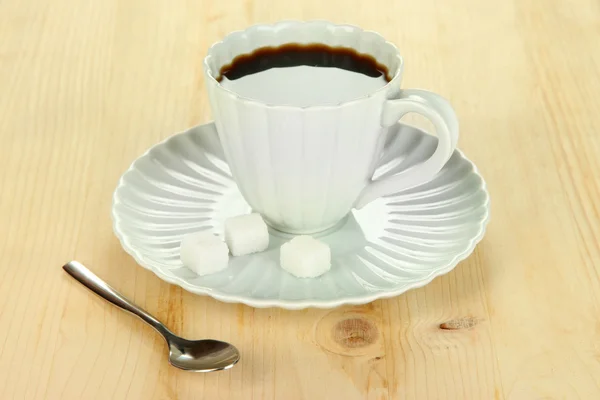 Coffee cup on wooden table close-up — Stock Photo, Image