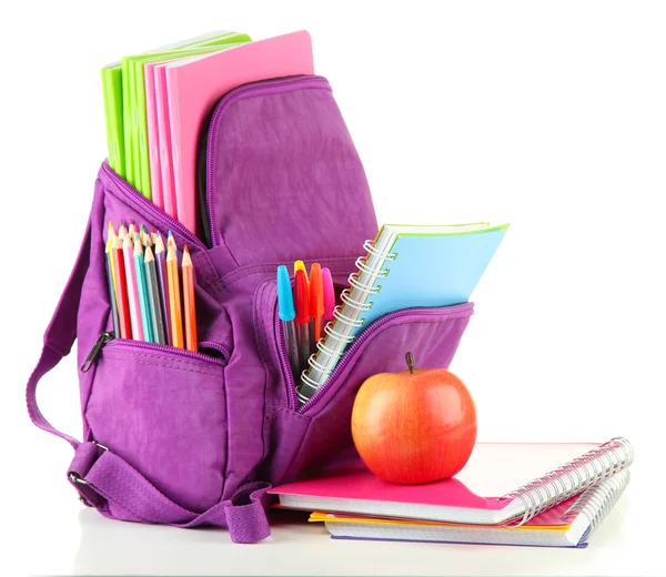 Mochila púrpura con material escolar aislado en blanco —  Fotos de Stock