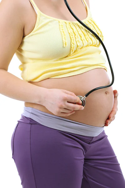 Pregnant woman with stethoscope listening baby close up — Stock Photo, Image