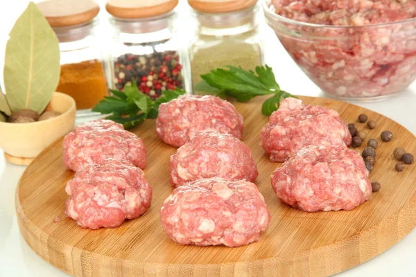 Stock image Raw meatballs with spices