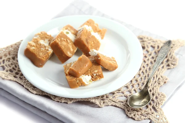 Sherbet con nueces en plato aislado en blanco —  Fotos de Stock