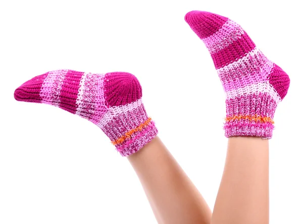 Patas femeninas en calcetines de colores, aisladas en blanco —  Fotos de Stock