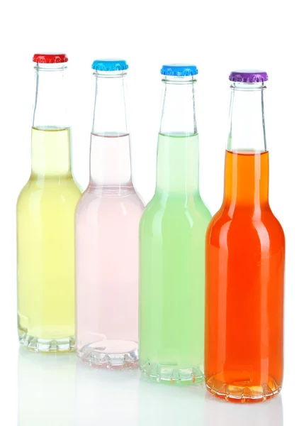 Drinks in glass bottles isolated on white Stock Image