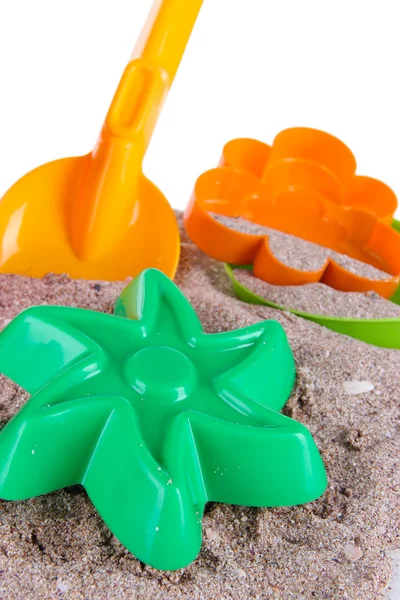 Zabawki dla dzieci na piasku na białym tle — Zdjęcie stockowe
