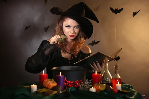 Halloween witch on dark background — Stock Photo, Image