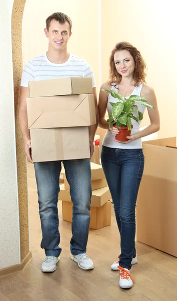 Young couple moves into new home