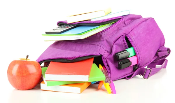 Lila ryggsäck med skolmaterial isolerad på vitt — Stockfoto