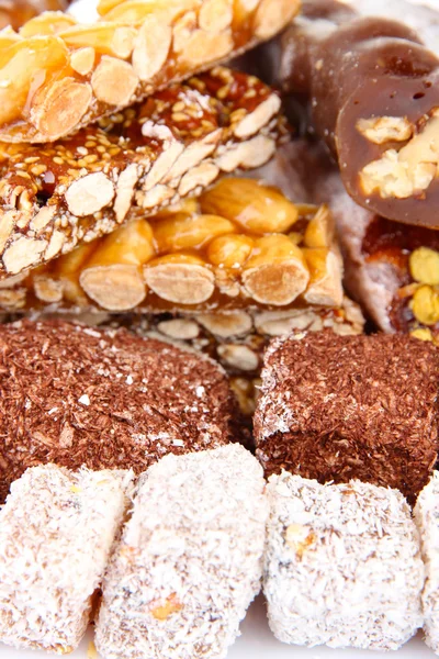 Smakelijke oosterse snoepjes, close-up — Stockfoto