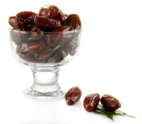 Dried dates in glass bowl isolated on white — Stock Photo, Image