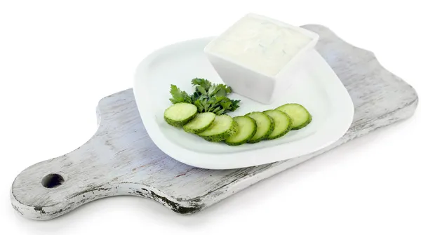 Cucumber yogurt in bowl, on white, isolated on white — Stock Photo, Image