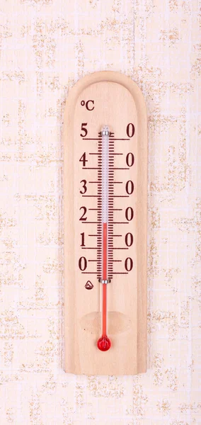 Thermometer on wall background — Stock Photo, Image