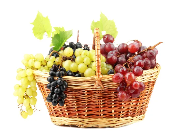 Assortment of ripe sweet grapes in basket, isolated on whit — Stock Photo, Image