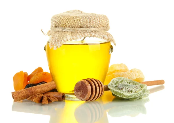 Jar of honey and dried fruits isolated on white — Stock Photo, Image
