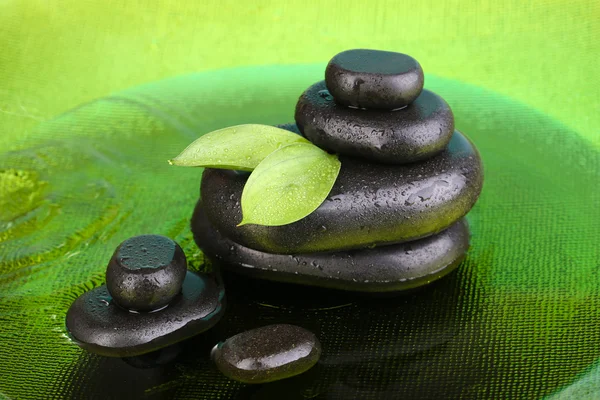 Wellness stones in water close-up — Stockfoto