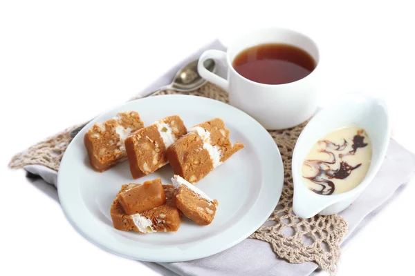 Sherbet con nueces en plato aislado en blanco —  Fotos de Stock