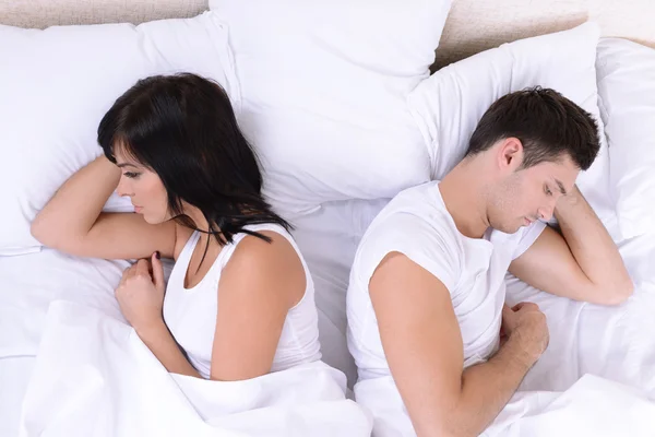Offended couple in bed — Stock Photo, Image
