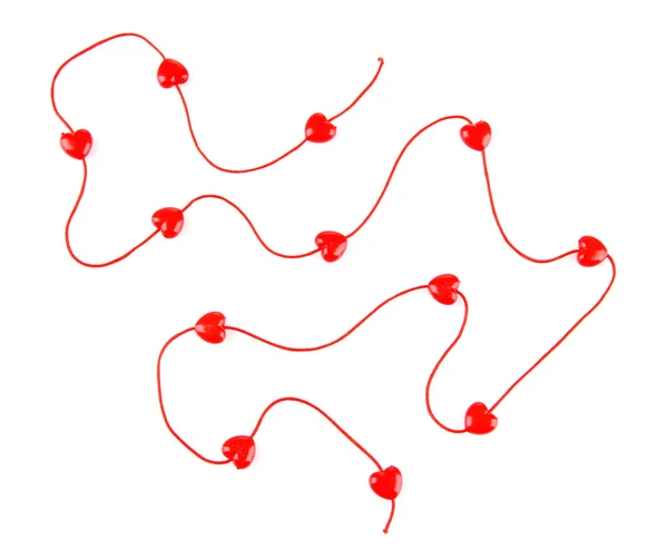 흰색 절연 문자열에 하트 모양의 구슬 — 스톡 사진