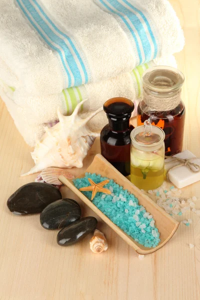 Sea spa elements on wooden table close up — Stock Photo, Image