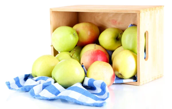 Sappige appels op servet in vak geïsoleerd op wit — Stockfoto