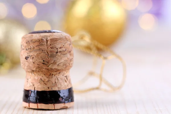 Champagne cork på jul ljus bakgrund — Stockfoto