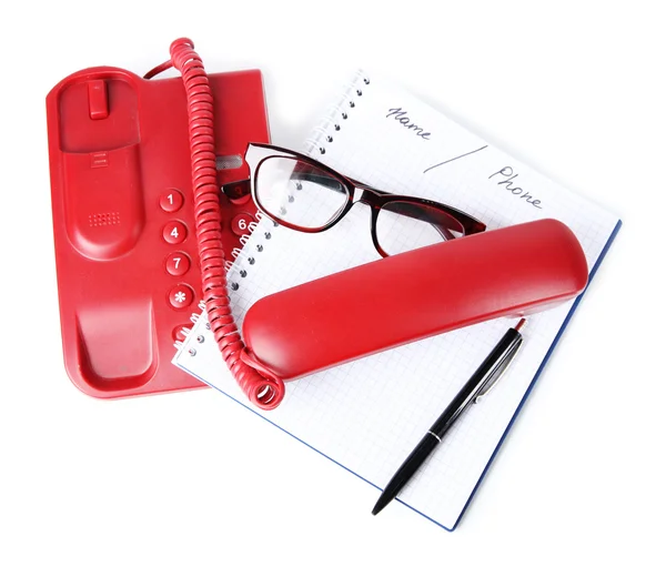Telephone and notepad and other items, isolated on white — Stock Photo, Image