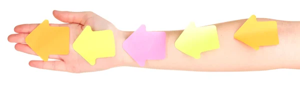 Mão e papéis de nota coloridos isolados em branco — Fotografia de Stock