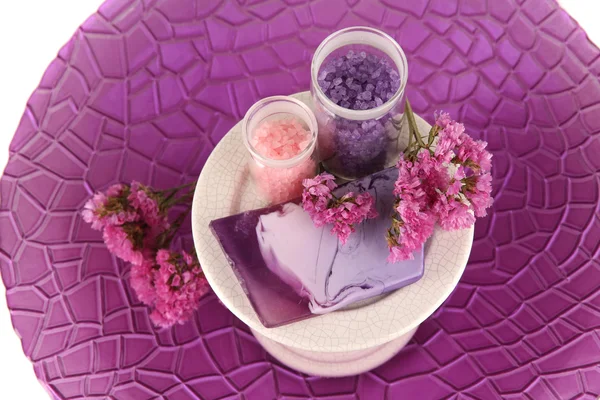 Hand made soap with sea salts on purple plate close-up — Stock Photo, Image