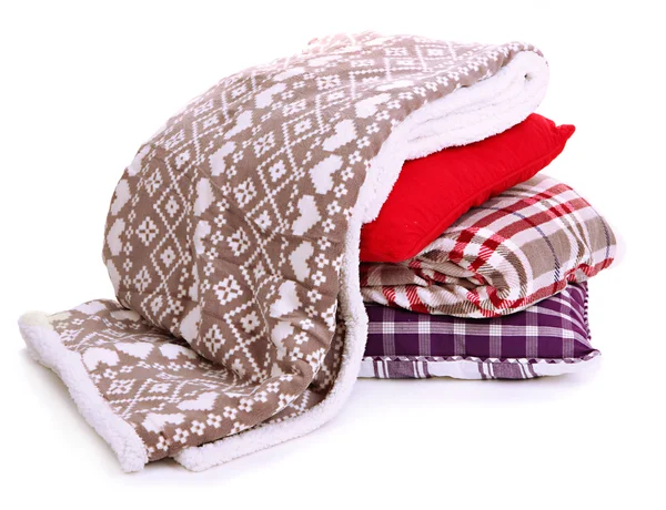 Warm plaids and pillows isolated on white — Stock Photo, Image
