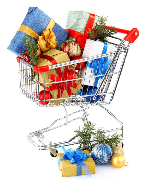 Christmas gifts in shopping trolley, isolated on white — Stock Photo, Image