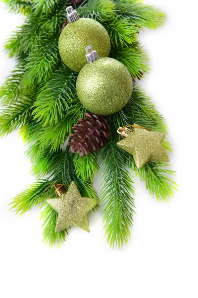 Christmas balls and decorative stars on fir tree, isolated on white — Stock Photo, Image