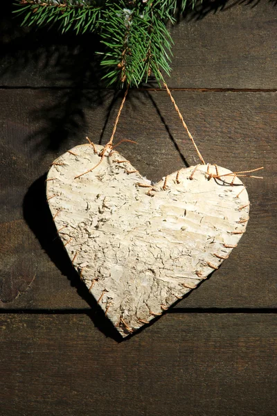 Decorative heart on rope, on wooden background — Stock Photo, Image