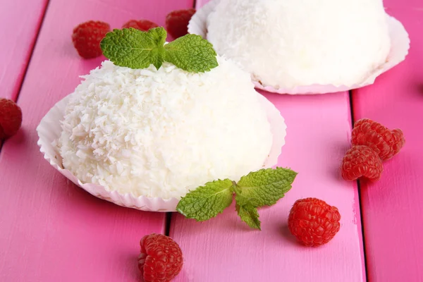 Delicious coconut cakes on table close-up — Stockfoto