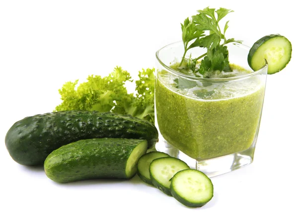 Glass of green vegetable juice and cucumber isolated on white — Stock Photo, Image