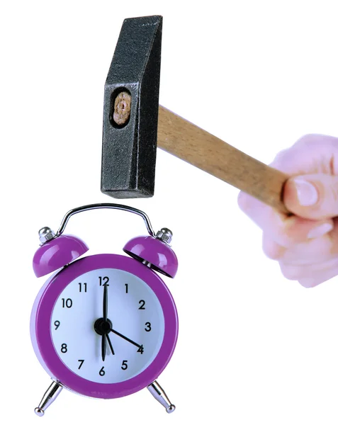 Hammer in hand and alarm clock isolated on white — Stock Photo, Image