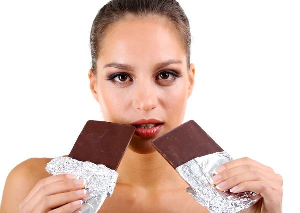 Portrait of beautiful young girl with chocolate isolated on white — Stock Photo, Image