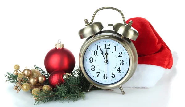 Alarm klok met santa hat en kerst decoratie op wit wordt geïsoleerd — Stockfoto