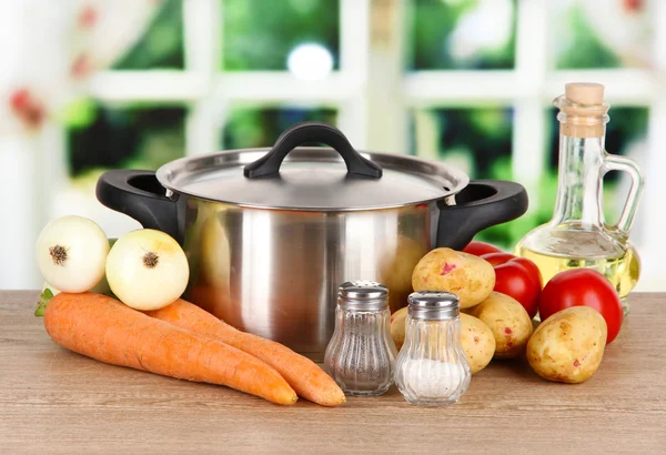 Ingredients for cooking soup on table in kitchen — Stock Photo, Image