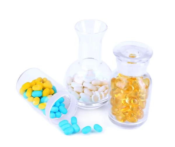 Botellas médicas y pastillas aisladas en blanco — Foto de Stock