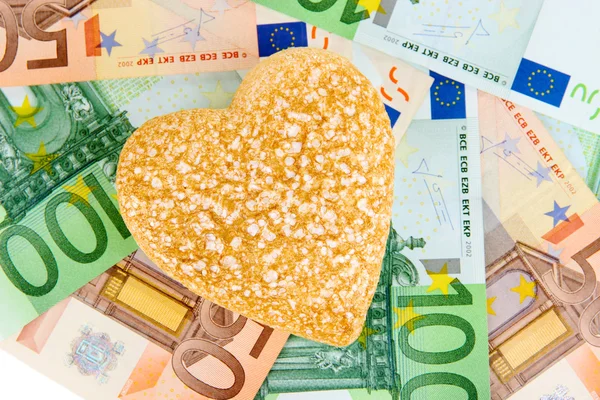 Love for money concept. Heart on European currency